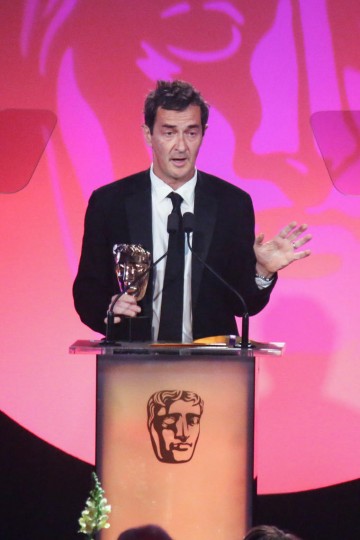 Julian Farino accepts the award for Director: Fiction sponsored by Mad Dog Casting at the British Academy Television Craft Awards in 2015