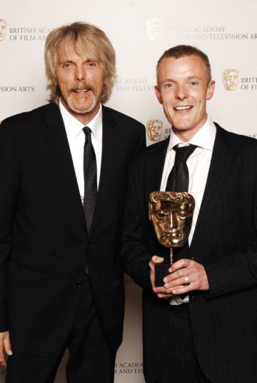 Martin Phipps celebrates his win in the Original Televisioin Music category for Wallander with Thin Lizzy's Scott Gorham, presenter of the award (BAFTA / Richard Kendal).