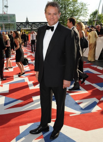 The Downton Abbey star, pictured here in a Chester Barratt suit,  is up for the Male Performance in a Comedy Programme award for his work in Twenty Twelve.