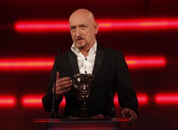 The BAFTA-winning actor, who voiced the King of Mist in Lionhead’s Fable III, presents the Academy Fellowship to Lionhead's Peter Molyneux. (Pic: BAFTA/Brian Ritchie)