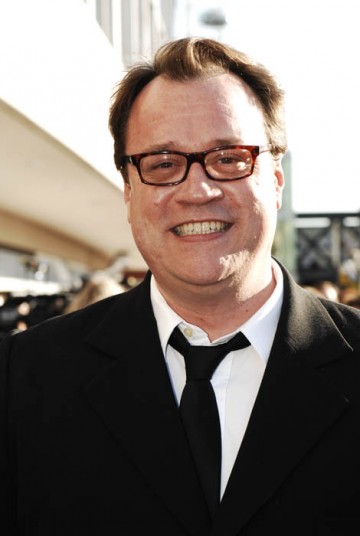 Doctor Who writer Russell T Davies smiles for the cameras on the red carpet (BAFTA / Richard Kendal).