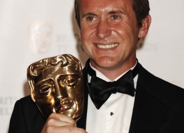 Bruce Parry, winner of the Factual Series Award for his adventure programme Amazon with Bruce Parry, celebrates backstage at the British Academy Television Awards in 2009 (BAFTA / Richard Kendal).