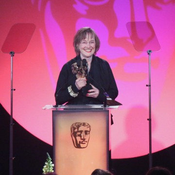 Phoebe De Gaye accepts the award for Costume Design at the British Academy Television Craft Awards in 2015