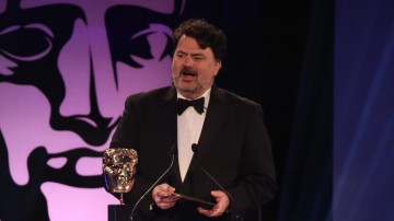Tim Schafer presents the award for Game Design at the British Academy Games Awards in 2015