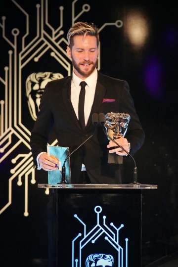 Troy Baker presents the award for Story