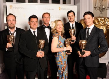 The team behind the BBC Winter Olympic titles celebrate their BAFTA win with Dr. Christian Jessen.