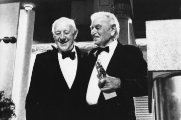 Sir Alec Guinness (left) celebrates receiving the Academy Fellowship with Sir David Lean in 1989.