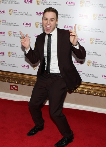 X Factor finalist Olly Murs marks his arrival on the Video Game Awards red carpet.