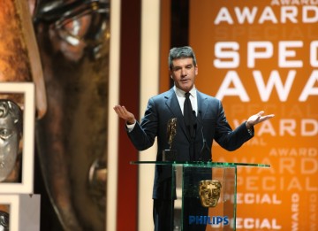 Producer Simon Cowell receives the Academy's Special Award. (BAFTA/Steve Butler)