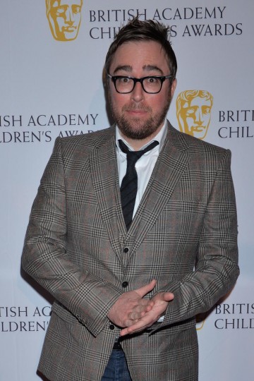 BAFTA-winning performer Danny Wallace stands on the red carpet of British Academy Children's Awards in 2014