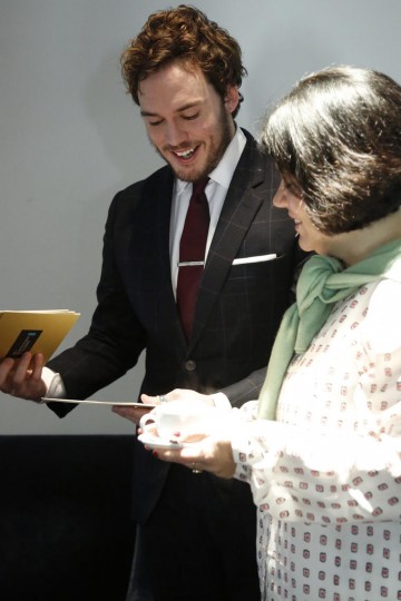Sam Claflin with Pippa Harris, preparing backstage ahead of the EE British Academy Film Awards nominations announcement on 9 January 2015