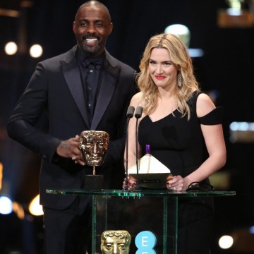 Idris Elba and Kate Winslet take to the stage to present the first award of the night for Outstanding British Film