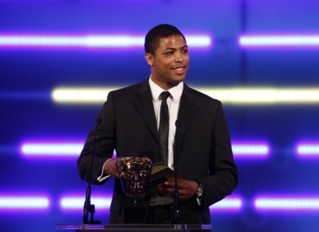 The England rugby union star announces the Handheld award winner. (Pic: BAFTA/Brian Ritchie)