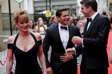 The three Downton Abbey cast members together on the red carpet before the BAFTA Downton Abbey Tribute event.