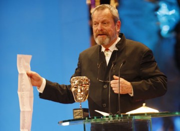 Director and former Monty Python Star Terry Gilliam reads a long list of thank yous as he accepts the BAFTA's highest honour, the Academy Fellowship (BAFTA / Marc Hoberman).
