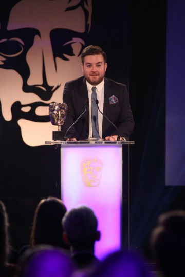 Alex Brooker presents the award for Multiplayer at the British Academy Games Awards in 2015