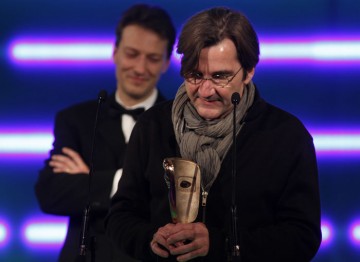A visibly moved Normand Corbeil, the composer of Heavy Rain's haunting score, accepts the award for Original Soundtrack. (Pic: BAFTA/Brian Ritchie)
