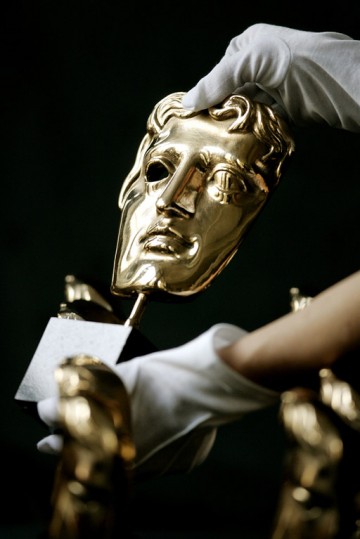 Before presentation at the Academy's Award ceremonies the masks are given a final polish (BAFTA / Marc Hoberman).