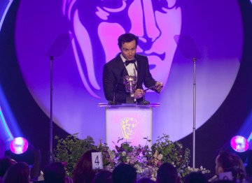 Sherlock star Andrew Scott presents the Award for Production Design.