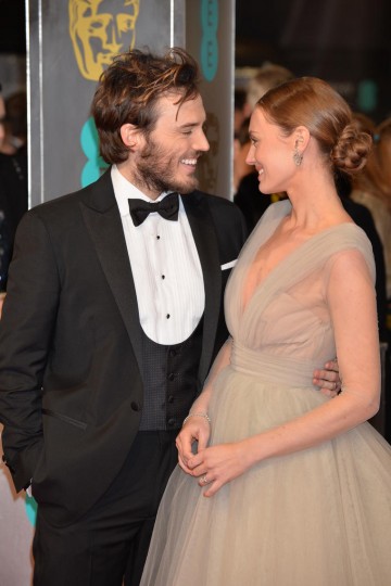 Sam Claflin and Laura Haddock arrive on the red carpet