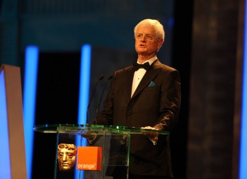 Tim Corrie makes his opening address at the top of the show. (Pic: BAFTA/Stephen Butler)