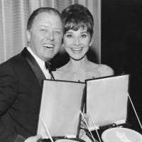 Richard Attenborough and film starlet Audrey Hepburn display their Actor and Actress awards at the British Film Academy Awards in 1965. 