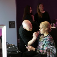 A M.A.C. makeup artist prepares Amanda