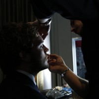 Sam Claflin is styled by a Lancôme make up artist ready for the EE British Academy Film Awards nominations announcement on 9 January 2015