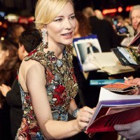 Nominated for her leading role in Carol, Cate Blanchett signs autographs for fans on the red carpet