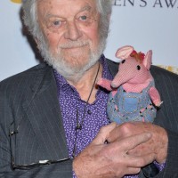 Special Award recipient Peter Firmin, the creator of the Clangers and Bagpuss among other classic characters, arrives at British Academy Children's Awards in 2014 -- with a tiny guest!