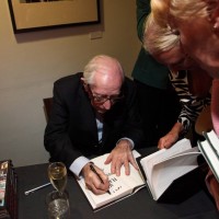 Lewis Gilbert signs copies of his autobiography 'All My Flashbacks'