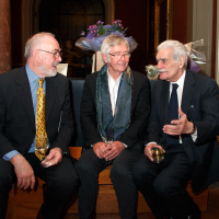Peter Egan, Sir Tom Courtenay and Omar Sharif chat over a drink at the reception.