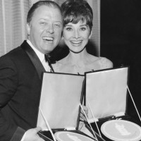 Richard Attenborough & Audrey Hepburn display their Actor and Actress awards at the British Film Academy Awards in 1965.