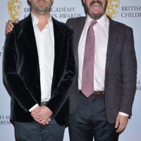 Twins Chris and Xand van Tulleken, presenters of Operation Ouch!, may look alike, but their reactions to arriving at the British Academy Children's Awards in 2014 are fairly different