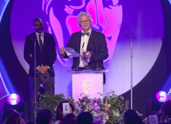 Neil McKay picks up the BAFTA for Break-Through Talent on behalf of Kwadjo Dajan who was unable to pick up the Award in person. Kwadjo won the Award as co-producer on Appropriate Adult.