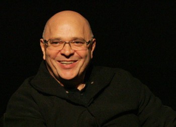 Anthony Minghella on stage at an Academy Life in Pictures event.