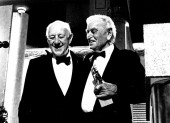 Sir Alec Guiness celebrates his Academy fellowship with Sir David Lean in 1989.