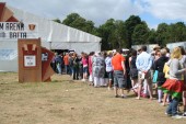 Festival Goers queue on Sunday morning to watch Angus, Thongs and Perfect Snogging