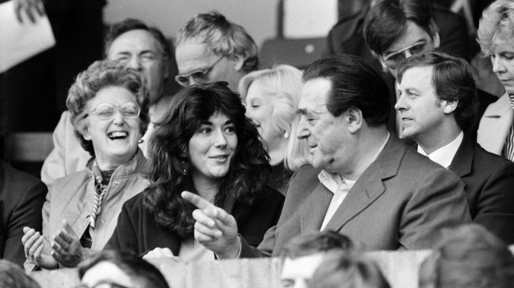 Robert Maxwell and his daughter Ghislaine watch the Oxford v Brighton football match.  13th October 1984.