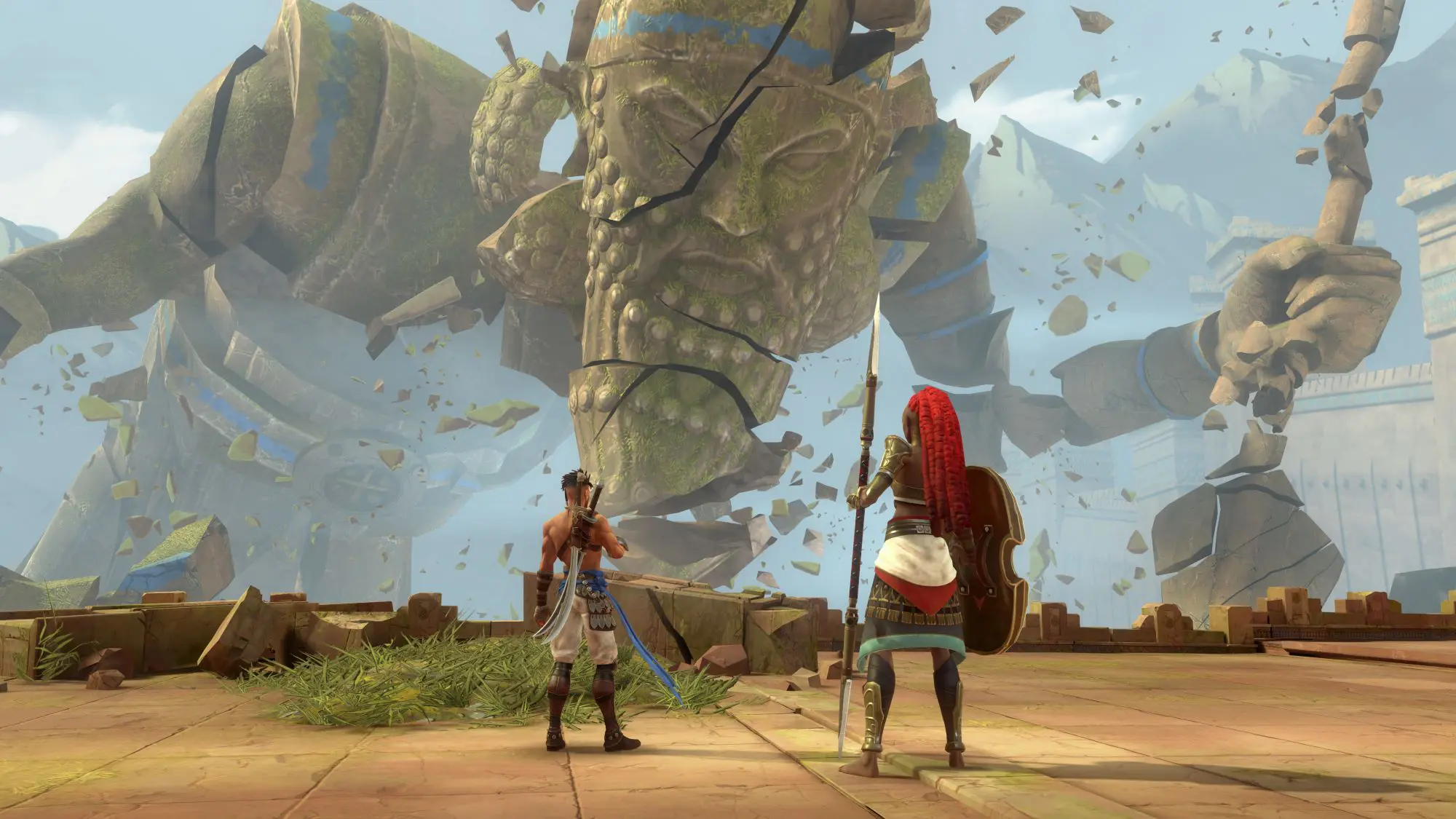 A giant stone figure with cracks across its face looming over two smaller figures who look armed for battle.