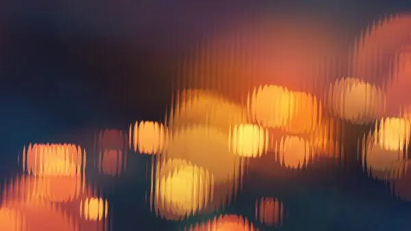 yellow-orange lens flares on a fluted navy background