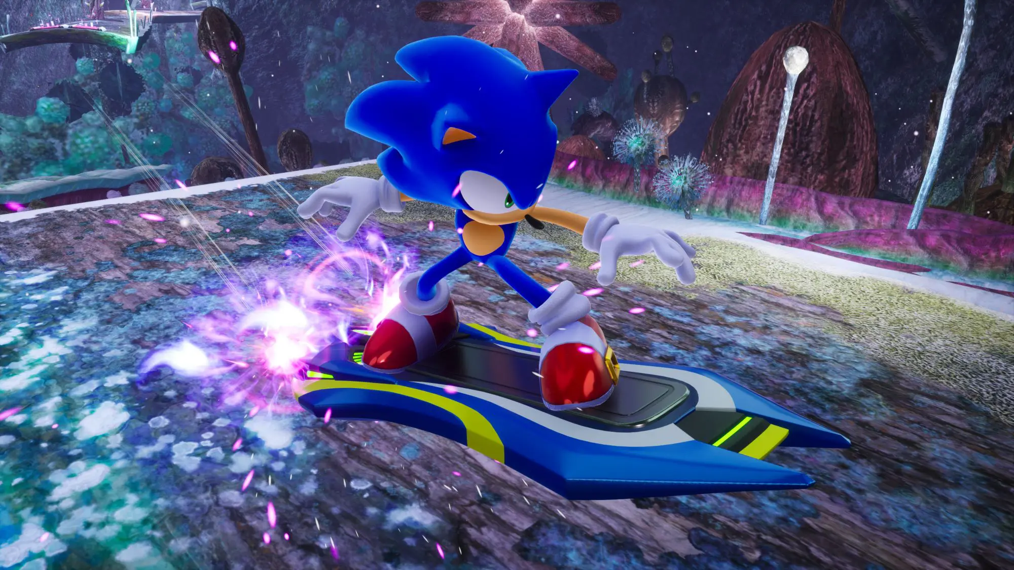A still from the game Sonic Racing CrossWorlds. Sonic, a blue hedgehog, is balancing on a blue and yellow hoverboard with purple power beams coming out the back.